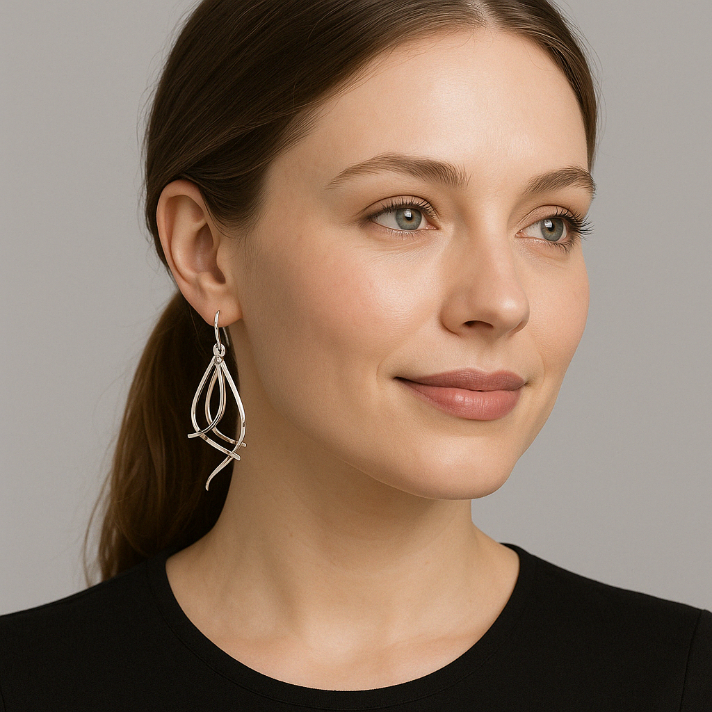 Sterling Silver Earrings with Four Movable Bent Sticks and Tumbaga