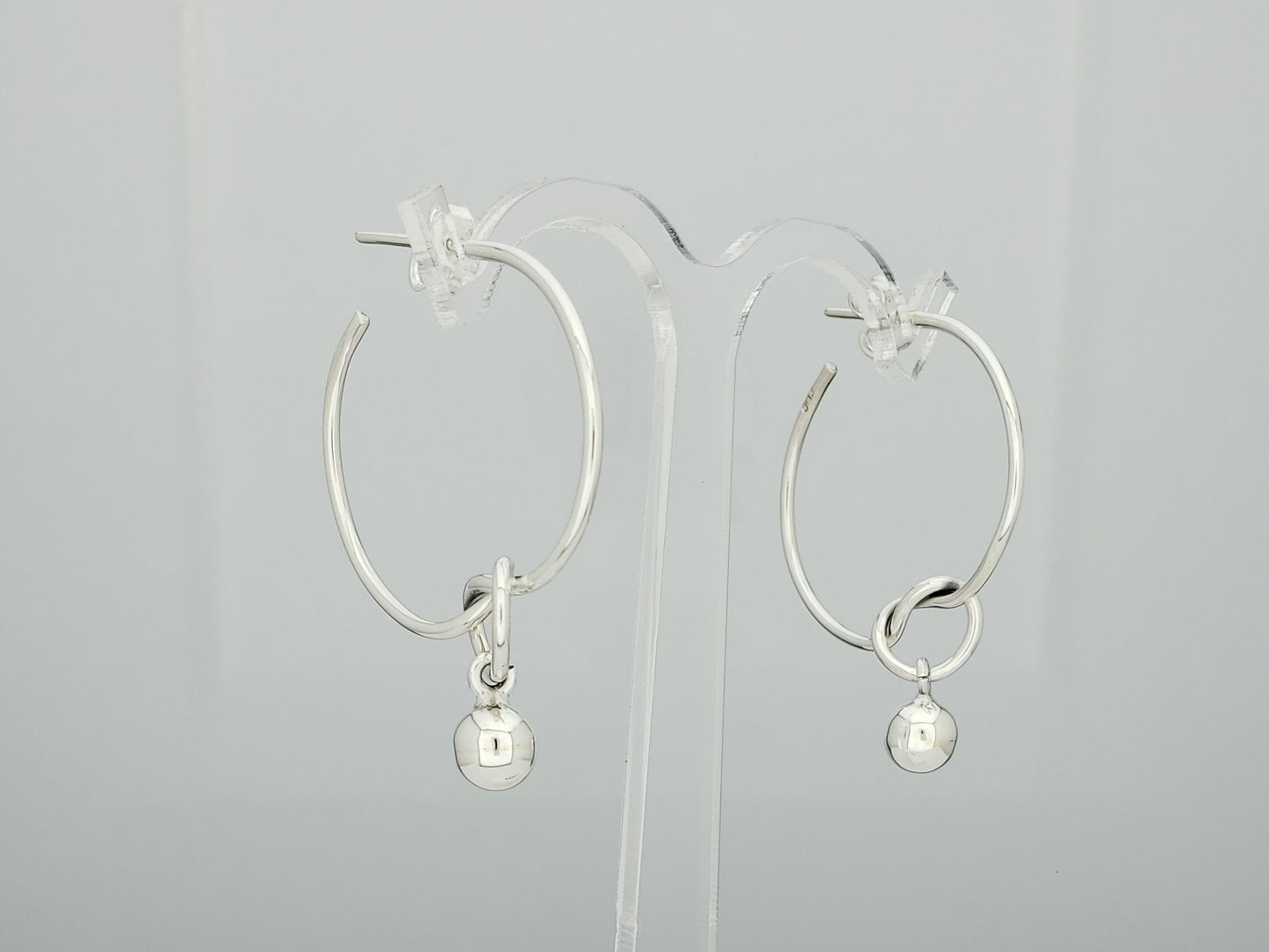 Sterling Silver Hoop Earrings with Knot and Pendant Ball