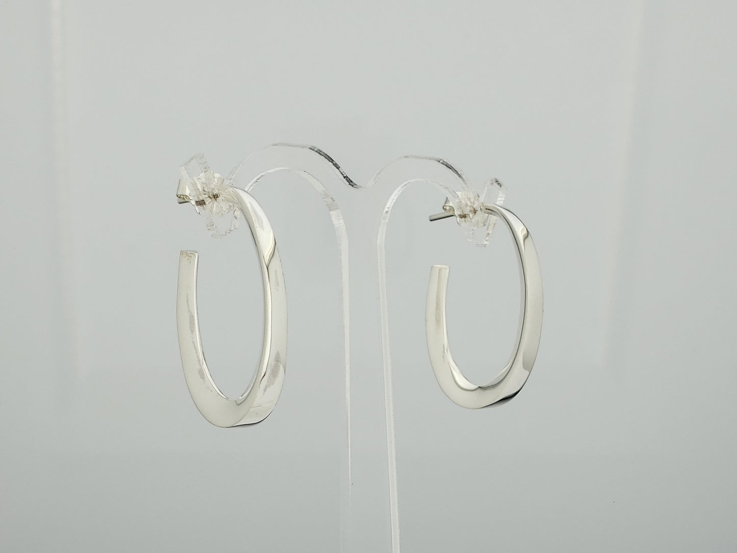 Sterling Silver Cardboarded Oval Earrings with Unlevel Girl Design