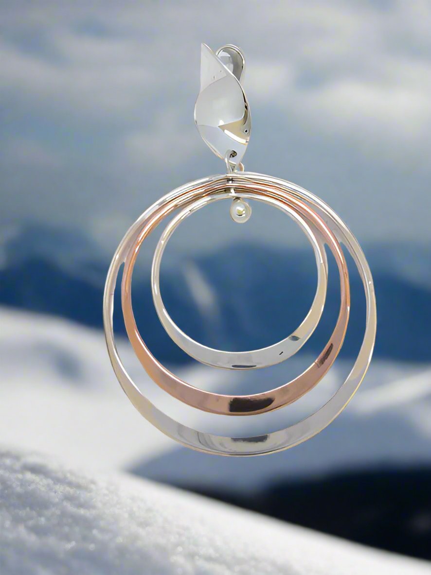 Sterling Silver Pendant with Three Bright Hoops and Seed