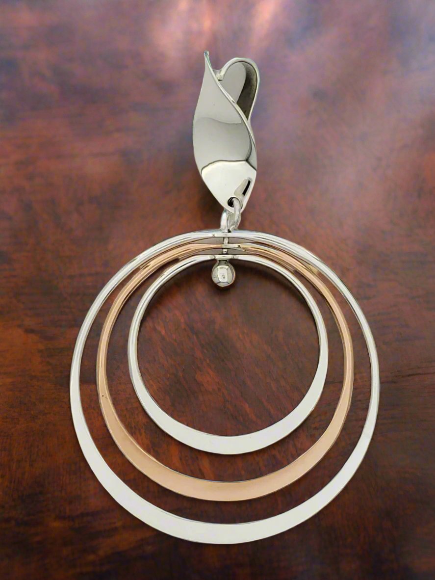 Sterling Silver Pendant with Three Bright Hoops and Seed