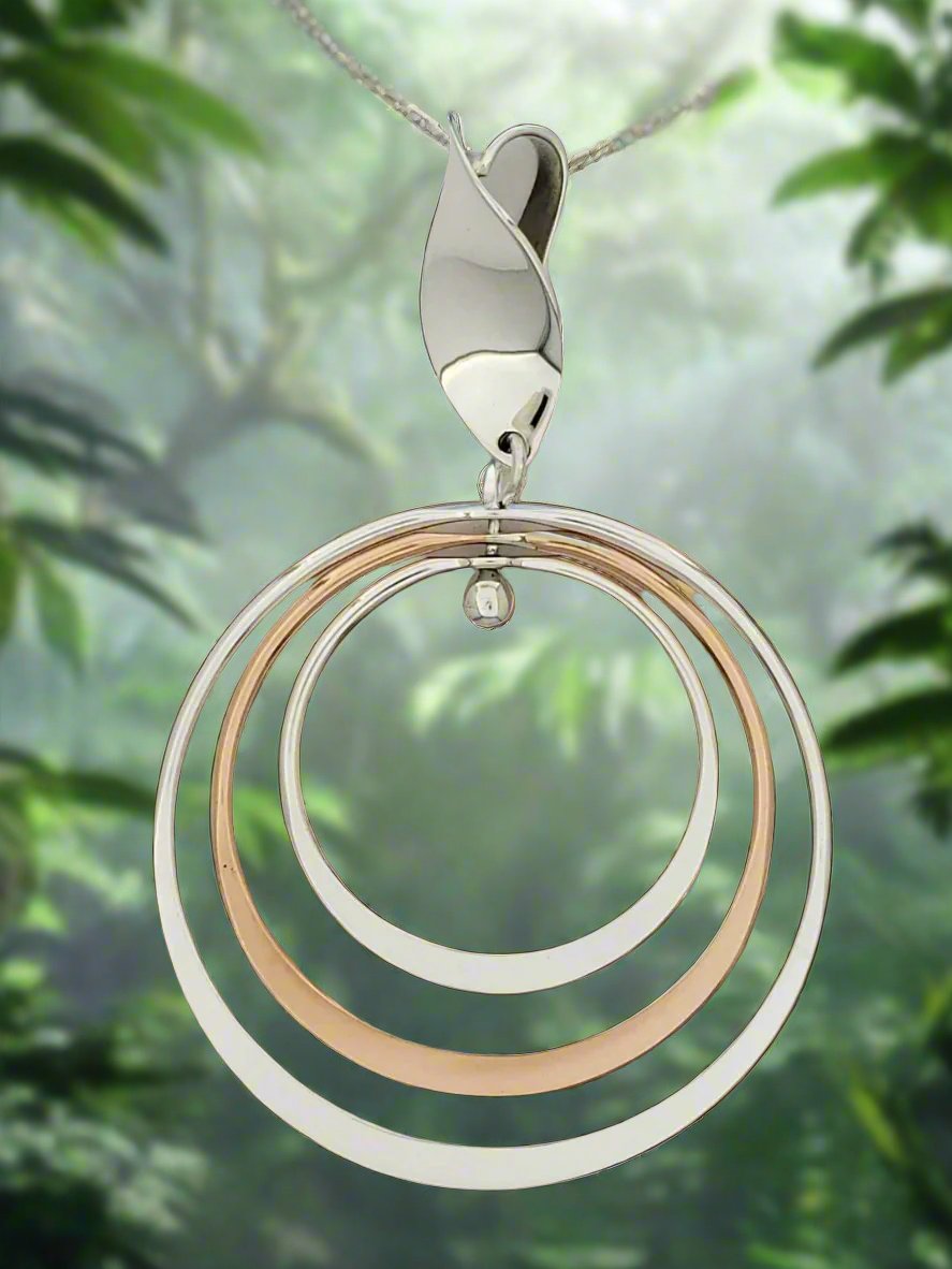 Sterling Silver Pendant with Three Bright Hoops and Seed