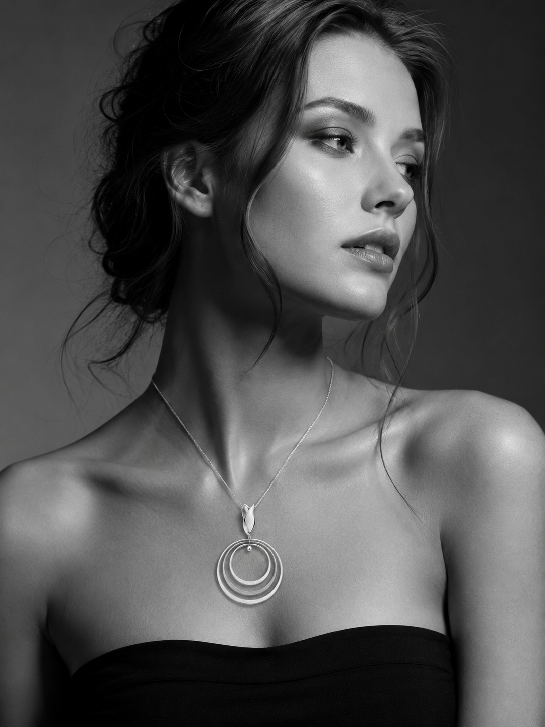 Sterling Silver Pendant with Three Bright Hoops and Seed