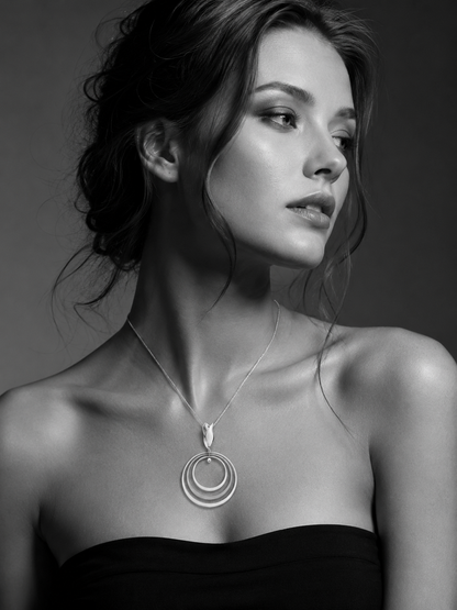 Sterling Silver Pendant with Three Bright Hoops and Seed