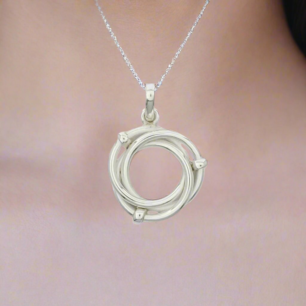 Elegant Three-Linked Hoop Pendant