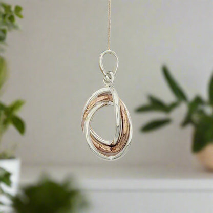 Sterling Silver Smooth Oval Interlaced Triple Wire Pendant